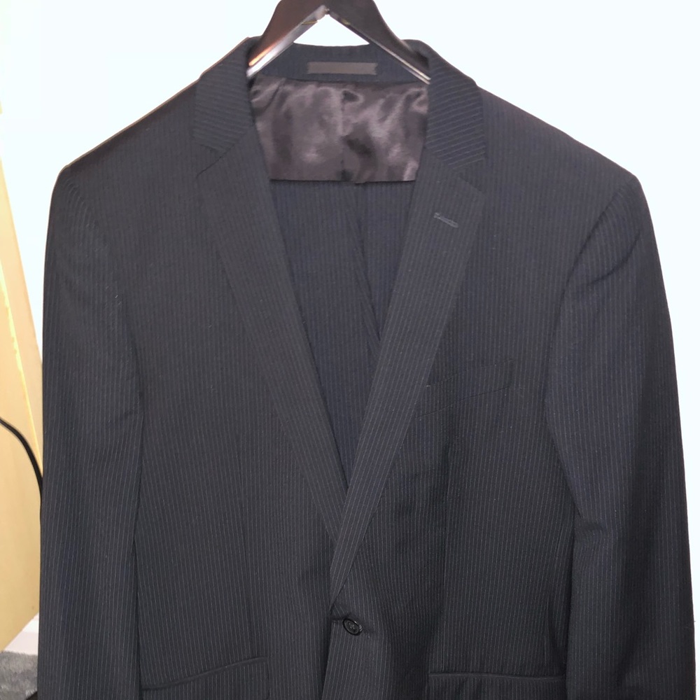 Black pinstripe suit.